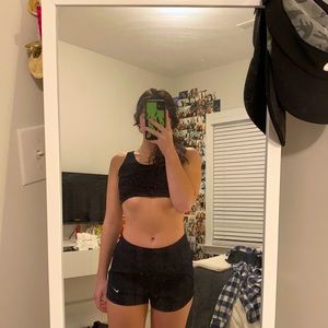 Black Nike running shorts